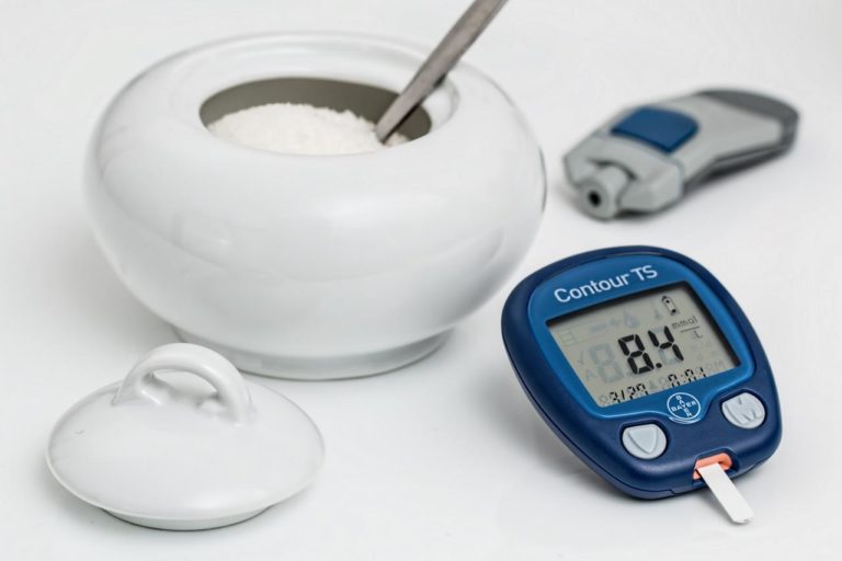 Monitoring health through blood glucose tests.